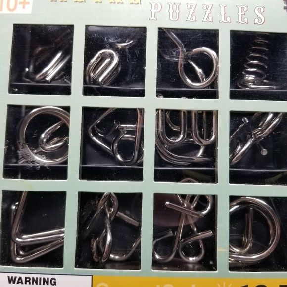 NEW - 12 PIECE METAL PUZZLES - TEST YOUR BRAIN! - Picture 3 of 3